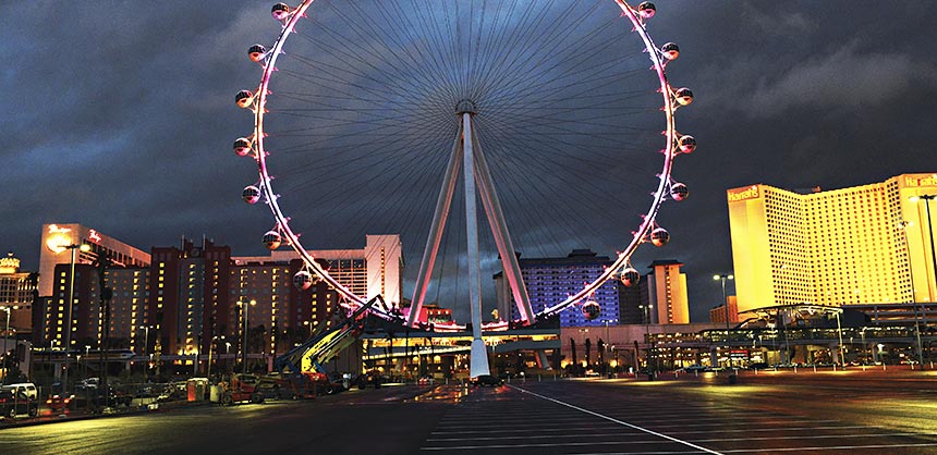 The 550-foot High Roller has 28 cabins that each hold up to 40 attendees. The world’s largest observation wheel towers over The Linq — Caesars Entertainment’s new open-air retail, dining and entertainment venue. Credit: The Las Vegas News Bureau In this photo provided by the Las Vegas News Bureau, the High Roller officially lights up the Las Vegas Strip. The world’s tallest observation wheel is the focal point of The LINQ, Caesars Entertainment’s $550 million outdoor retail, dining and entertainment district. Friday, February 28, 2014. (Photo/Las Vegas News Bureau, Darrin Bush)