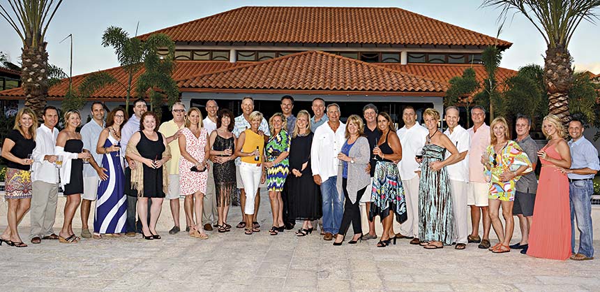 Enjoying the Matrix Communications Inc. reception at Sandals LaSource Grenada are (l to r) Karie Timion, Mark and Jocelyn Hechtl, John and Carolyn Mirviss, Brian and Lisa Finnvik, Craig and Suzanne Nordstrom, Dan Galbraith, Mary Jo McGowan, Charlie and Lori Eicher, Ann and Tom Pearson, Tammy Peterson and Jim Peterson, Steve and Kareen Ferry, Mike and Paulette Parrott, Frank Millo, Susan and Kevin Peters, Peter McAllister, Lori Robbins, Mike Ellis, Shannon and Jason Cardwell. Credit: Matrix Communications Inc.