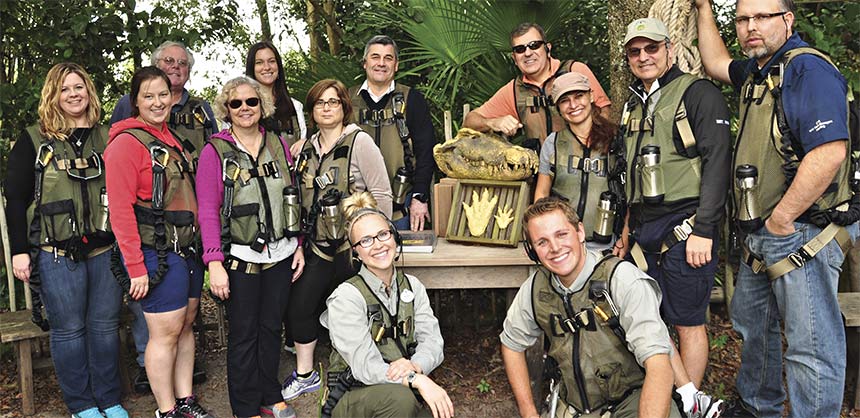 Employees of Becton Dickinson venture off the beaten path at Disney’s Animal Kingdom as part of a private sunset adventure that featured a trek through an unexplored forest and a journey across a savanna filled with exotic animals. Credit: ©Disney