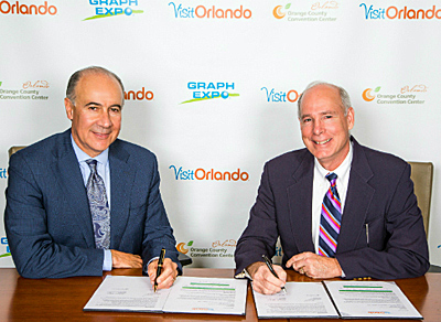 Visit Orlando President and CEO George Aguel (left) and Graphic Arts Show Company President Ralph Nappi.