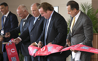 Key Caesars Entertainment executives and New Jersey dignitaries cut the ribbon to the Harrah’s Atlantic City Waterfront Conference Center. L to R: Michael Massari, Senior Vice President of Caesars Entertainment National Meetings & Events; Don Guardian, Mayor of Atlantic City; Steven Sweeney, New Jersey State Senate President; Gary Loveman, Chairman of the Board of Directors, Caesars Entertainment; Mark Frissora, President and CEO of Caesars Entertainment Corporation.