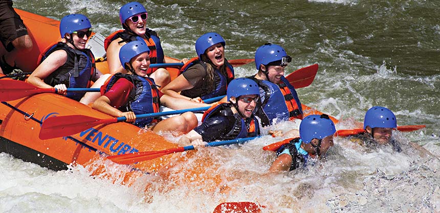Working as a team, rafters navigate the rapids in New River Gorge in West Virginia. Credit: Adventures on the Gorge