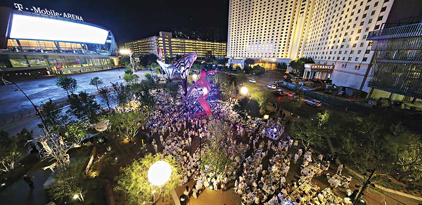 Guests danced the night away underneath Bliss Dance, a 40-foot-tall statue by artist Marco Cochrane located in the heart of The Park. Credit: Tony Tran Photo