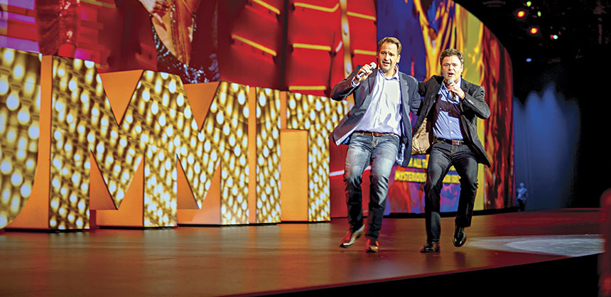 Donny Osmond (r) kicked off the Adobe Summit with song and dance along with John Mellor, Adobe V.P., Strategy, Business Development and Marketing.