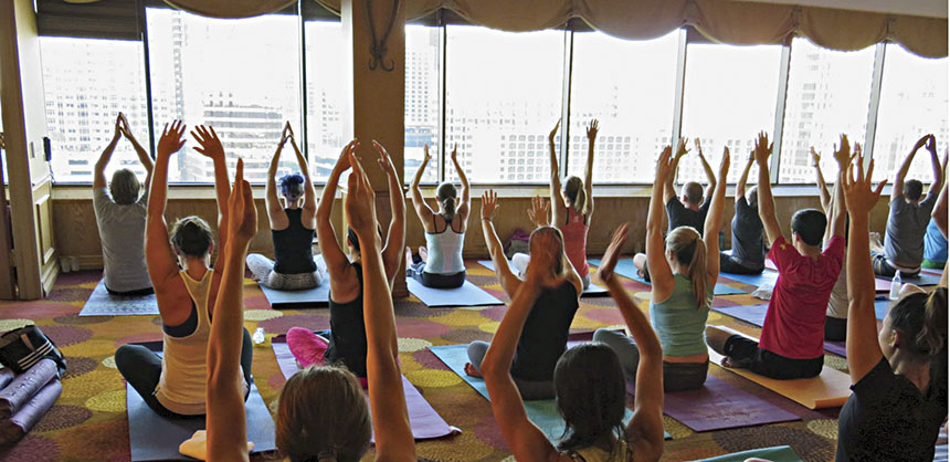 Teambuilding activities such as yoga classes can help to bring your attendees together and serve as a stress-relief tool at a business meeting.