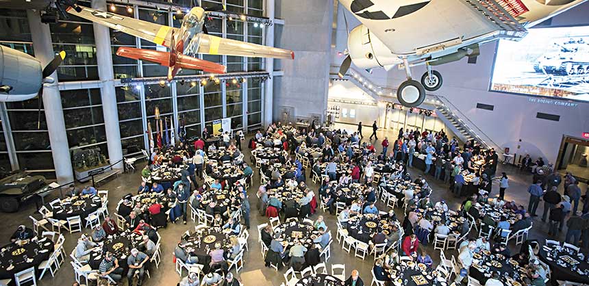 The attendees of the Technology Exchange enjoyed dinner in the National WWII Museum’s Freedom Pavilion and a performance by the Victory Belles. Credits: Mark McDonald Photography