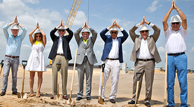Executive team members at Thursday's ceremony welcoming the new Margaritaville hotel in Orlando.