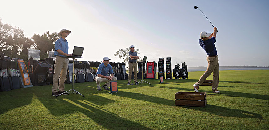 Sea Island Resort Golf Performance Center Manager Craig Allan (second from right) coaches a club-fitting session.