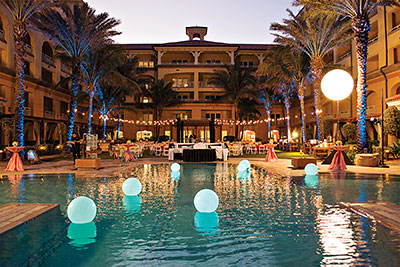 An evening's event by the pool at Eau Palm Beach Resort & Spa.