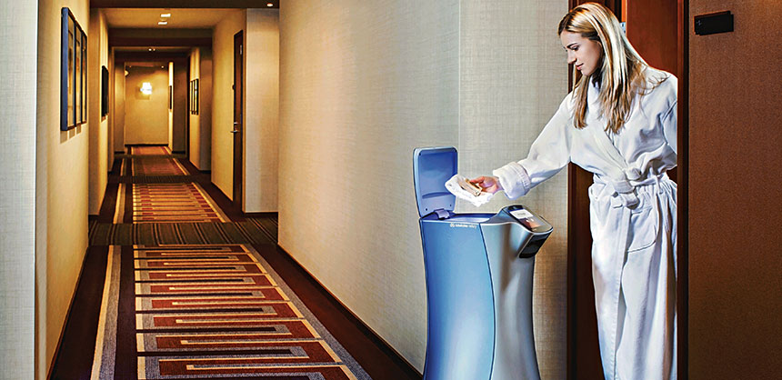 Answering the hotel room door in a robe became a little less revealing with Savioke’s new Relay Robot delivering your bath towel. Credit: Savioke