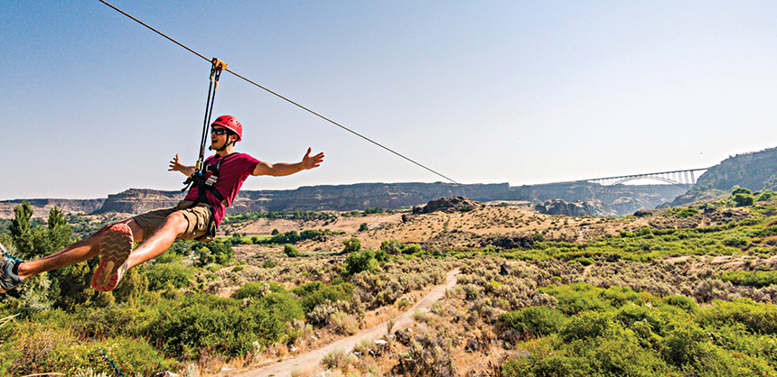 A rider enjoys the zip line at Twin Falls in South Central Idaho.