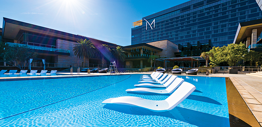 Partially submerged lounge chairs are perfect for cooling off in the sun at the M Resort pool in Henderson on Thursday, March 29, 2018. CREDIT: Mark Damon/Las Vegas News Bureau