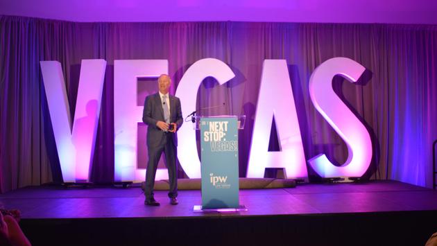 PHOTO: LVCVA CEO Steve Hill speaks to the crowd at a press conference at IPW. (photo courtesy of TravelPulseCanada)