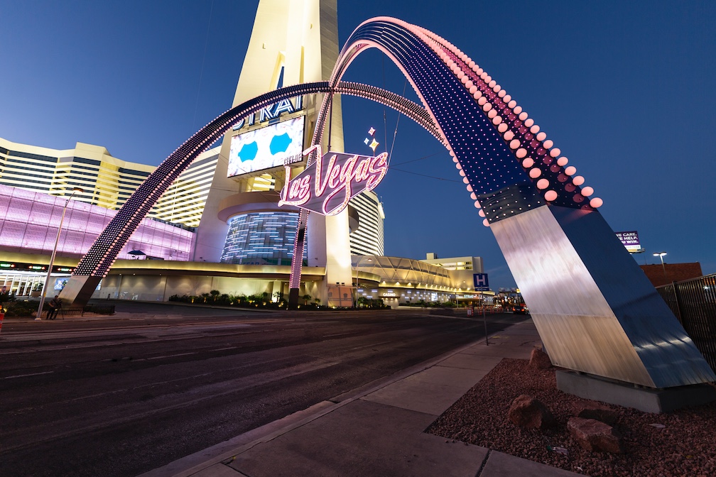 Las Vegas' sparkling purple arches contrast the one in St. Louis