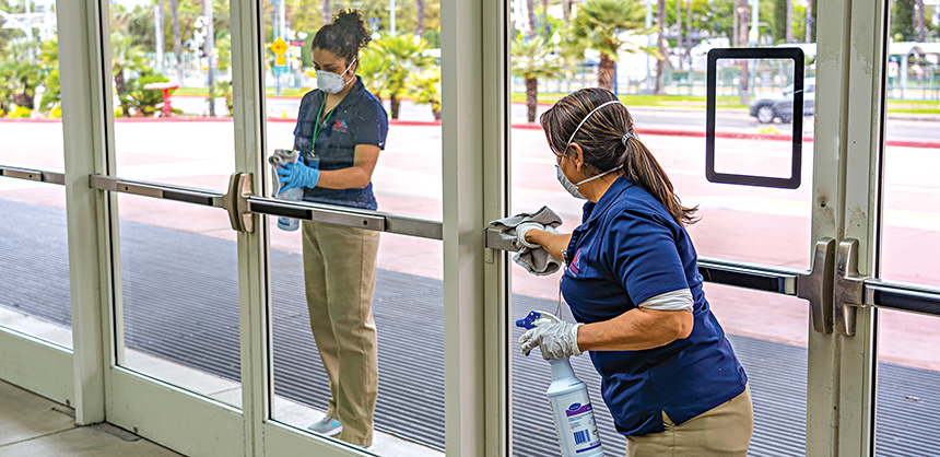 Attendees can expect to see increased attention to cleanliness, like what these workers at the San Diego Convention Center are doing, to promote health and safety.  Courtesy of Karen Totaro