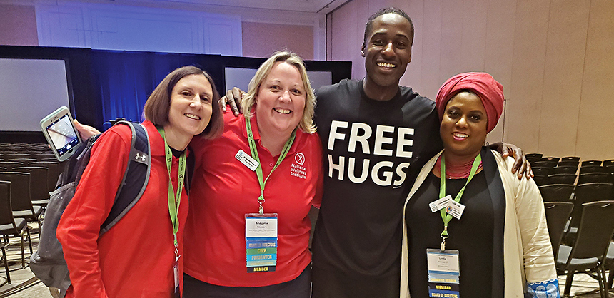 The National Wellness Institute brought in Ken E. Nwadike Jr. — the "Free Hugs Guy" — to a recent event as part of the Institute's focus on health and wellness for its attendees. Photo courtesy of NWI