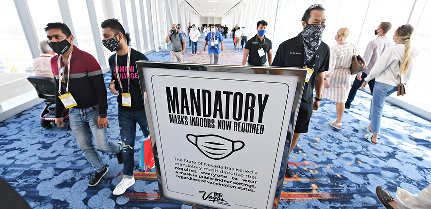 A sign reminds attendees of the mandatory mask policy during the opening day of ASD Market Week held in late summer at the Las Vegas Convention Center. Photo by Sam Morris, LVCVA / Las Vegas News Bureau