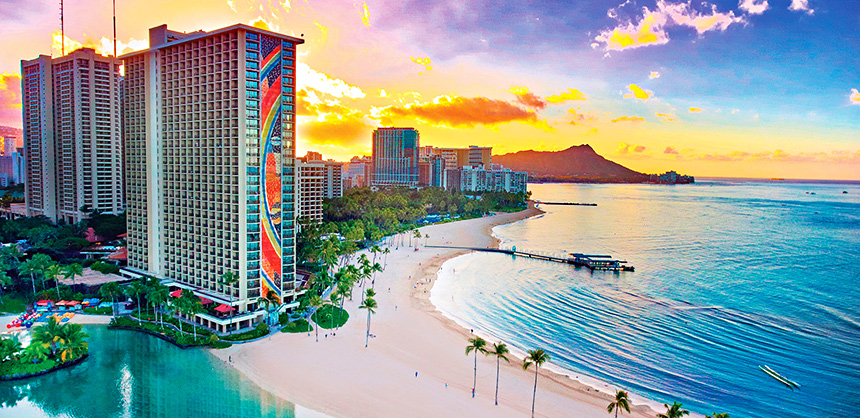 Pictured, the iconic Rainbow Tower at the Hilton Hawaiian Village Waikiki Beach Resort in Honolulu, where in the early ’80s, Frank Passanante got the spark that ignited his career.