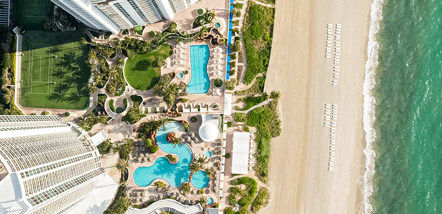 Trump International Beach Resort Miami offers a lower pool deck and lawn on the Atlantic Ocean.