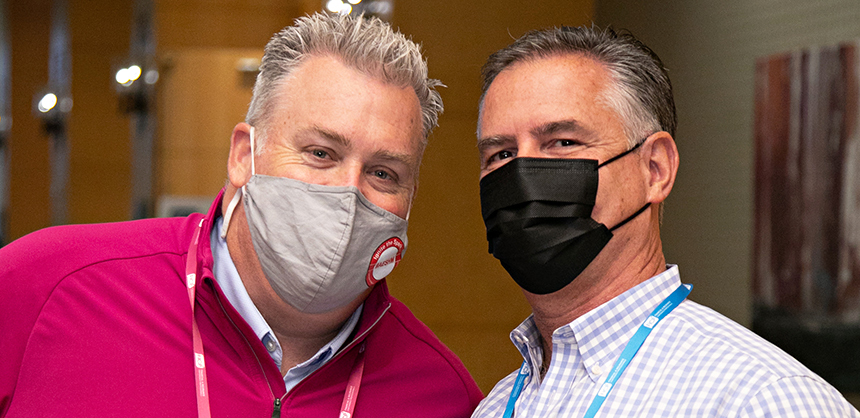 Joe Fijol, left, and Michael Burke, right, wear masks at the recent 2021 FICP Annual Conference as part of the safety protocols. Christopher Barr Photography