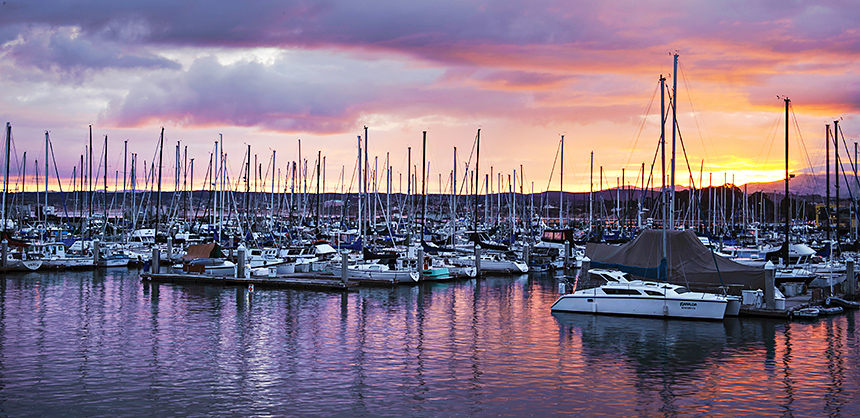 Pictured, Monterey Bay Harbor Sunset. California has long been a destination favored by planners and attendees.  SeeMonterey.com