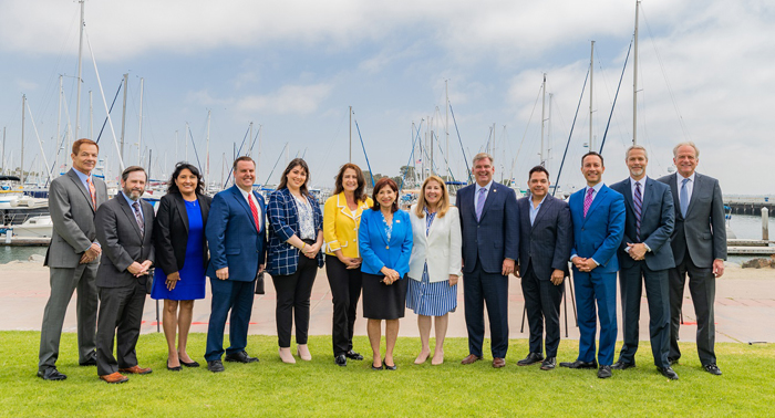 The Port of San Diego and the City of Chula Vista celebrate close of financing for the Chula Vista Bayfront project. (L to R: Port Chief Financial Officer Robert DeAngelis, Port President & CEO Joe Stuyvesant, Chula Vista City Manager Maria Kachadoorian, Chula Vista Councilmember John McCann, Chula Vista Deputy Mayor Andrea Cardenas, Chula Vista Councilmember Jill Galvez, Chula Vista Mayor Mary Casillas Salas, Port Commissioner Ann Moore, Port Chairman Dan Malcolm, Chula Vista Councilmember Steve Padilla, Port Vice Chairman Rafael Castellanos, City Attorney Glen Googins, Port General Counsel Thomas Russell.)