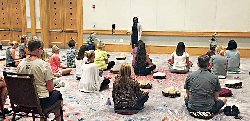 Wellness activities at conferences and events can include meditation, stretching, yoga, tai chi, hiking, morning or afternoon runs, learning healthy recipes, acupressure and more. Courtesy of Kristine Iverson