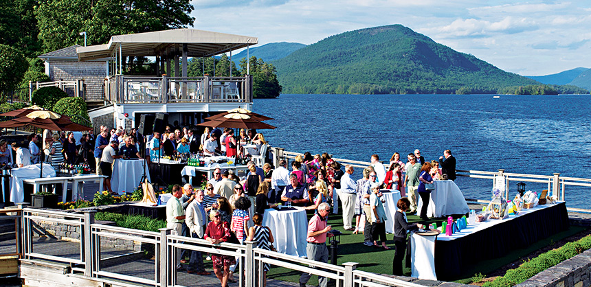Attendees gather for a networking event at The Sagamore’s outdoor space overlooking Lake George in Bolton Landing, NY. Courtesy of Lake George Regional Chamber of Commerce & CVB