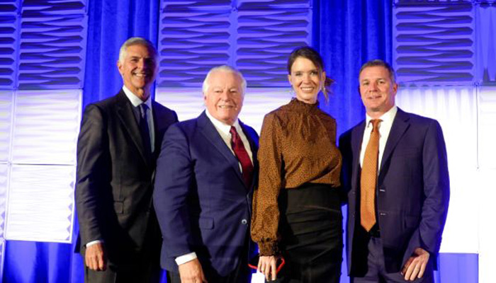 (L to R) Hilton President and CEO Chris Nassetta, Roger Dow, Visit California President and CEO Caroline Beteta, U.S. Travel Association President and CEO Geoff Freeman.