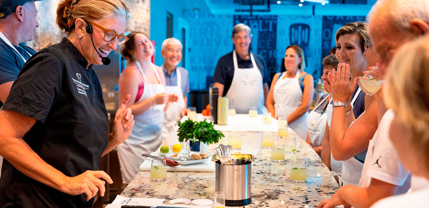 In person events, such as this cooking class, offer fun ways to engage with others. Photo credit: Norwegian Cruise Line