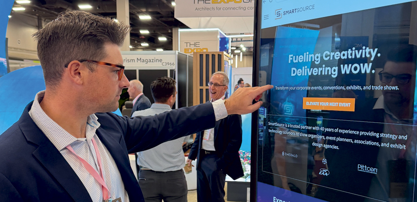 Bryan Hill at IMEX America 2025 shows off his SmartSource products.