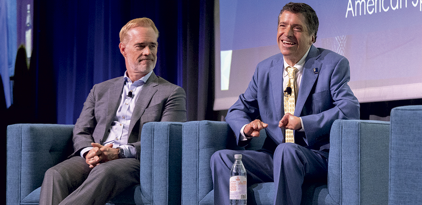 American sportscaster Joe Buck with inspirational keynote speaker John O’Leary at a Goodwill Dallas event. Courtesy of GDA Speakers