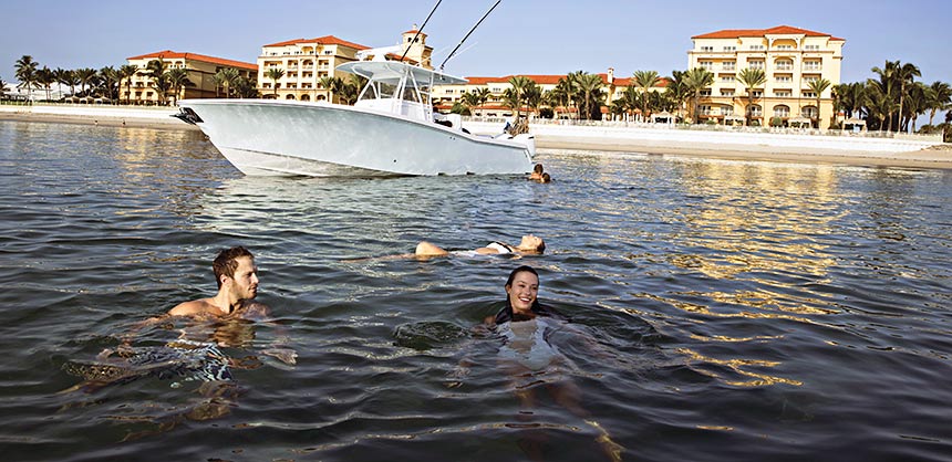 Cooling off in the Atlantic Ocean at Eau Palm Beach Resort & Spa.
