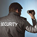 Security Guard Standing Near Stairway
