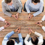 close up of business team sitting at table