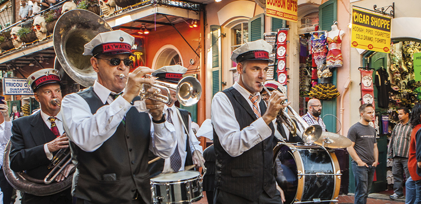 Many companies opt to create their own parade or include a second line band as part of their activities at an event. Photo courtesy of New Orleans & Company/Richard Nowitz