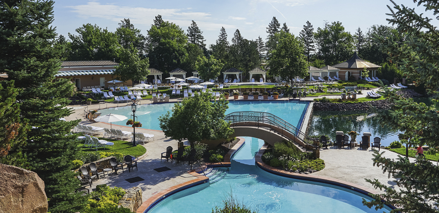 The Broadmoor offers many amenities, including a lakeside pool with a scenic view.