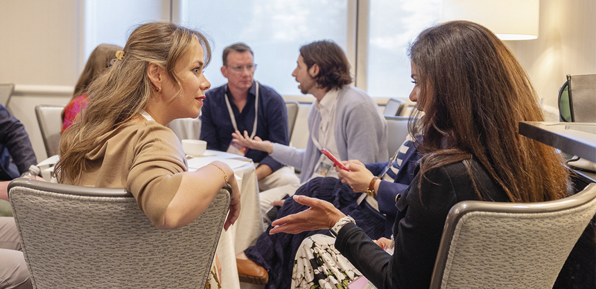 Using round tables helps attendees to more naturally connect. Photo courtesy of Ashley Case