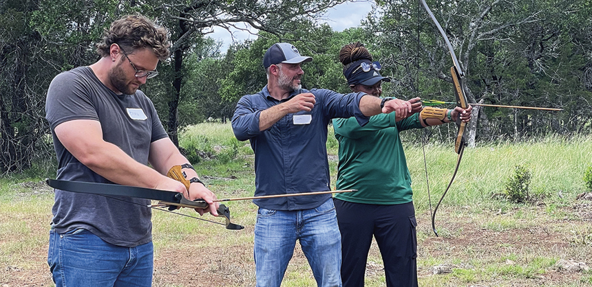 Creating natural environments for networking is better than forcing interaction. Pictured: Attendees learn to use a bow at Horse + Bow. Photo courtesy of Kristine Palmer